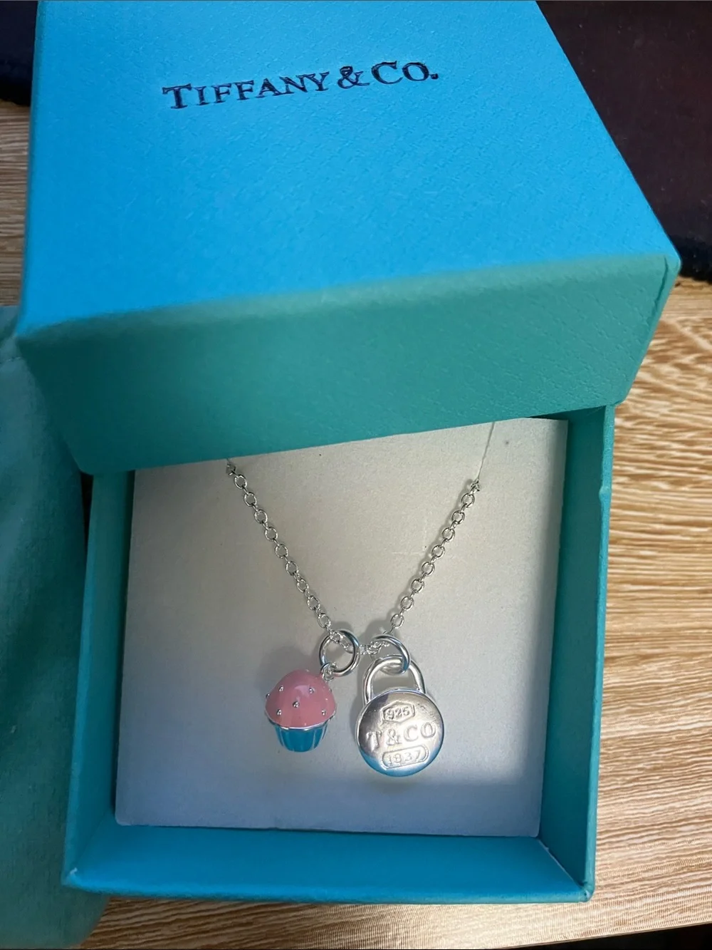 Tiffany & Co. Sterling Silver Necklace with Pink Cupcake and Padlock Charms